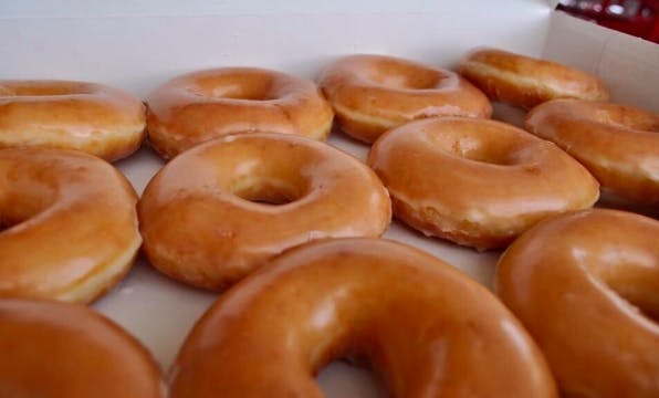 Stop everything. You can now buy Krispy Kreme scented candles heat